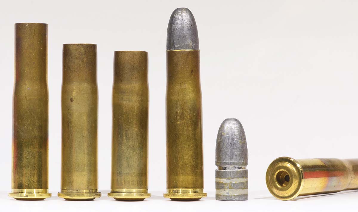 Stages of fashioning my 11.15x51R Kurz cartridge, beginning with 43 Mauser brass, cut down to 2.1 inches, and then to 2.0 inches. The bullet is a 370-grain hollow-base from a custom mould, cut to duplicate the original UMC bullet for the .43 Mauser and .43 Spanish. Note the convex base of the cartridge case, known in Germany as the Type-A.